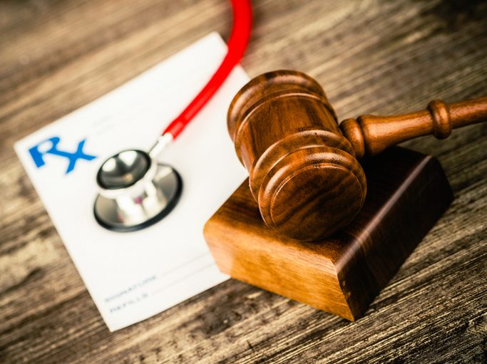 Stephen C. Carter, PC Attorney at Law | Hartwell, GA | prescription pad with stethoscope and gavel
