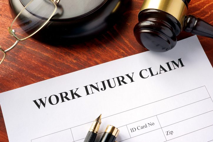 Stephen C. Carter, PC Attorney at Law | Hartwell, GA | work injury claim form on a table